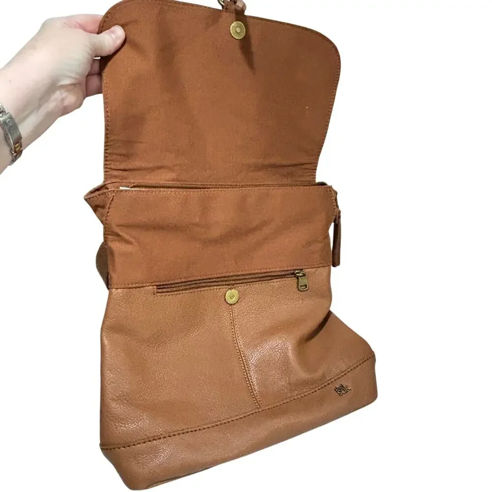 The Sak caramel brown leather messenger bag studded backpack Boho casual purse